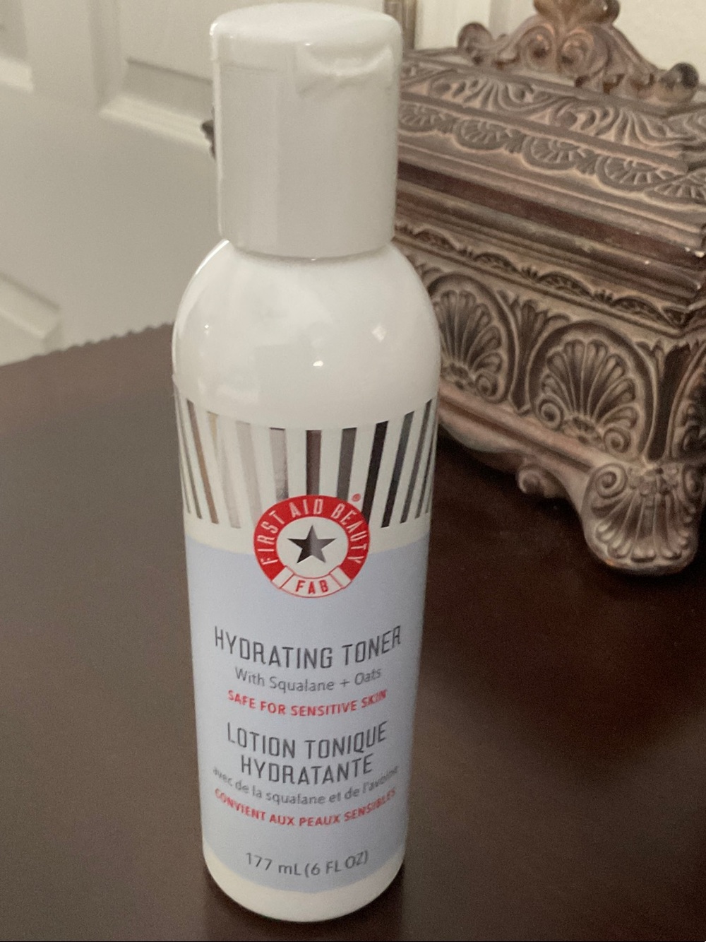 First Aid Beauty Hydrating Toner - White & Light Blue Bottle with Red Logo